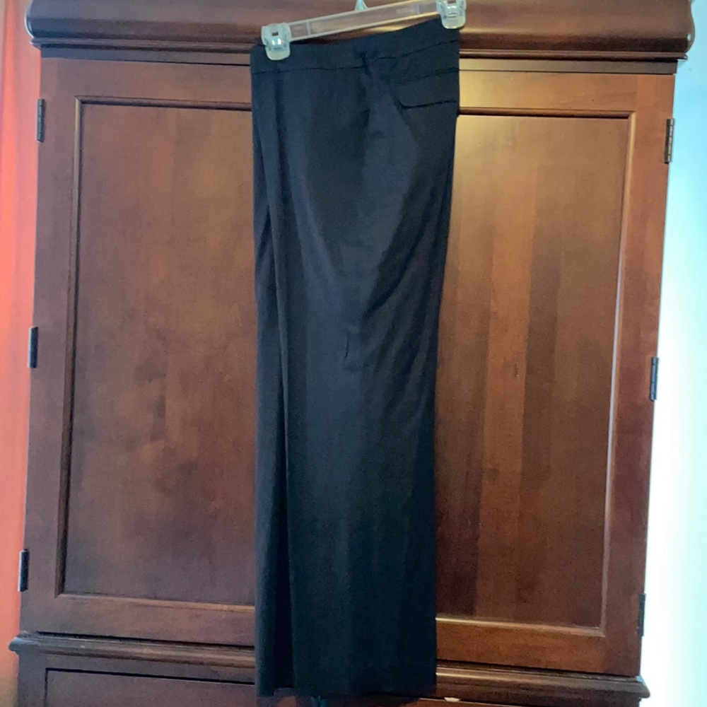 Woman’s black satin pants.